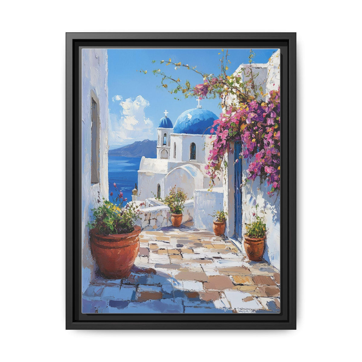 Santorini wall art framed canvas print in a black wood frame