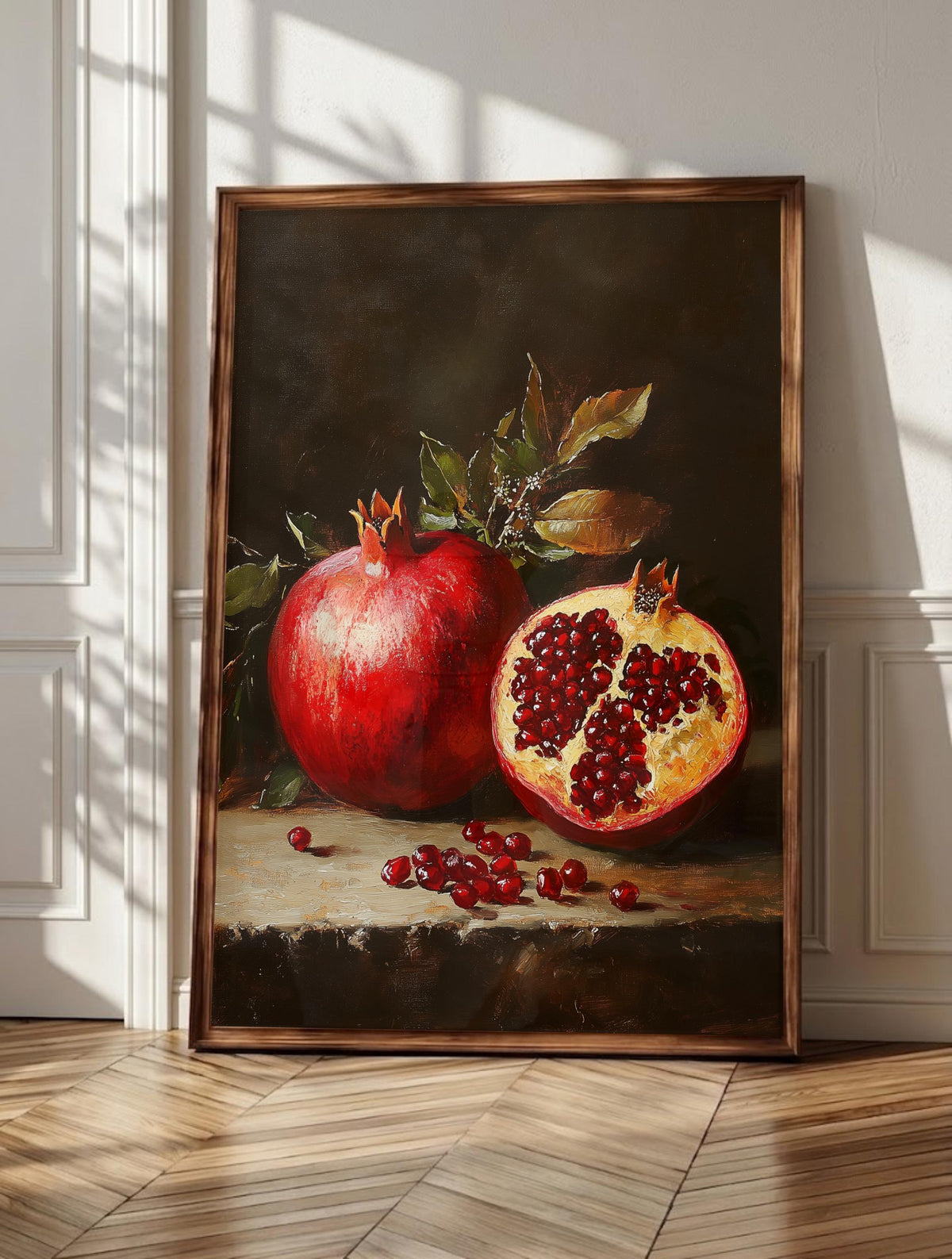 Pomegranate wall art: a whole ruby fruit beside a split one heavy with seeds