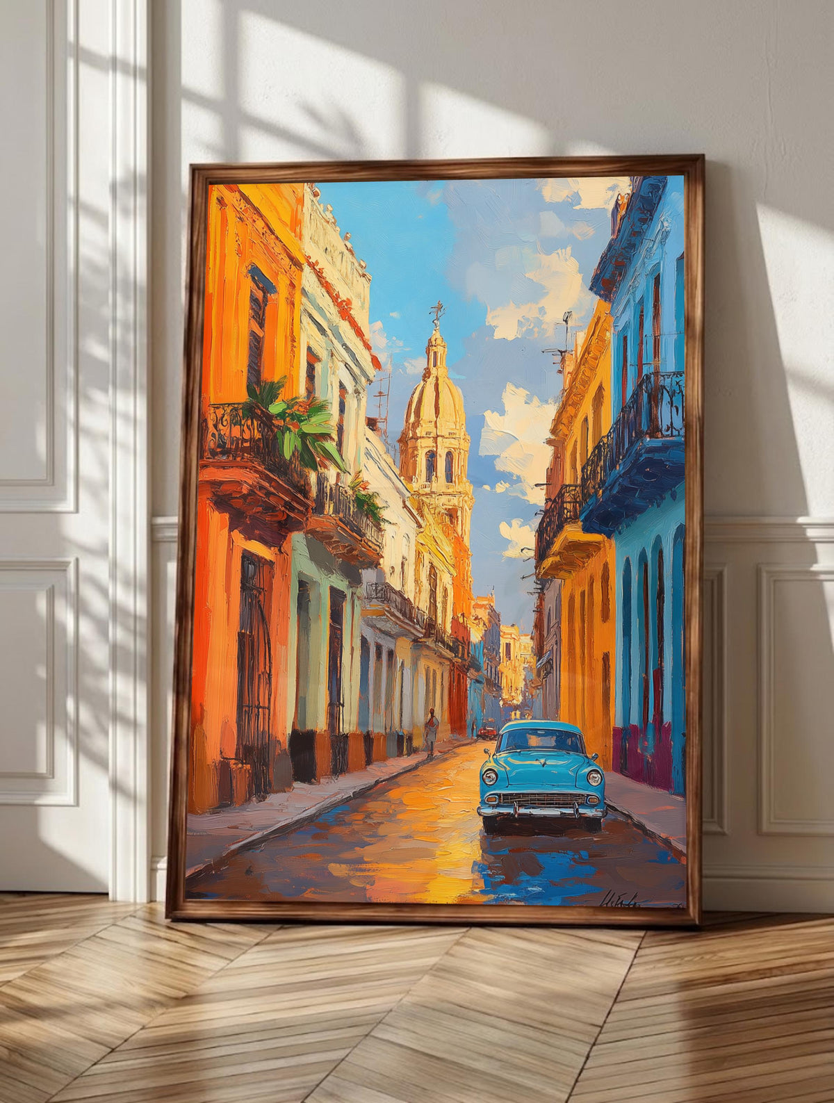 Havana wall art: a vintage car waiting on an Old Havana street of coloured facades