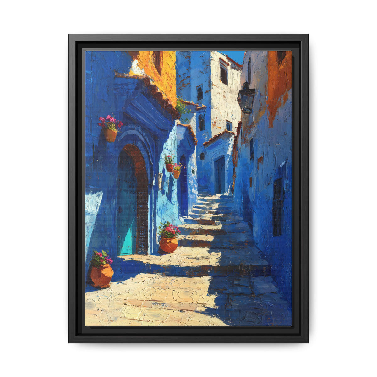 Chefchaouen wall art framed canvas print in a black wood frame