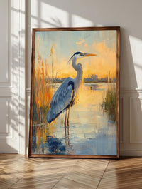 Blue heron wall art: a great blue heron standing still among tall golden reeds