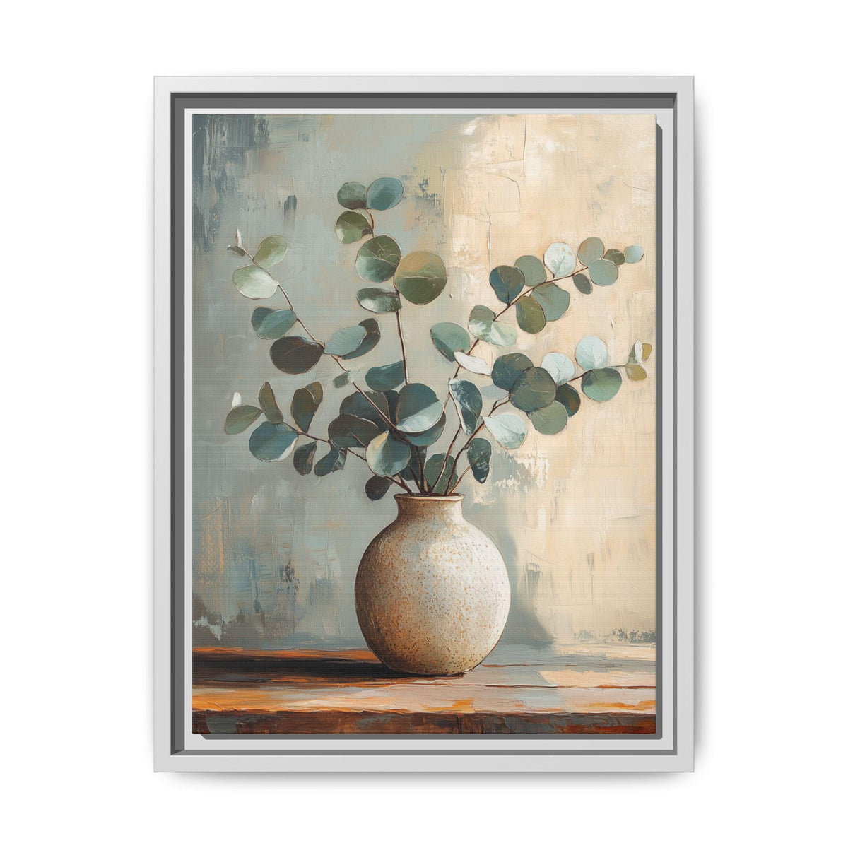 Eucalyptus wall art framed canvas print in a white wood frame